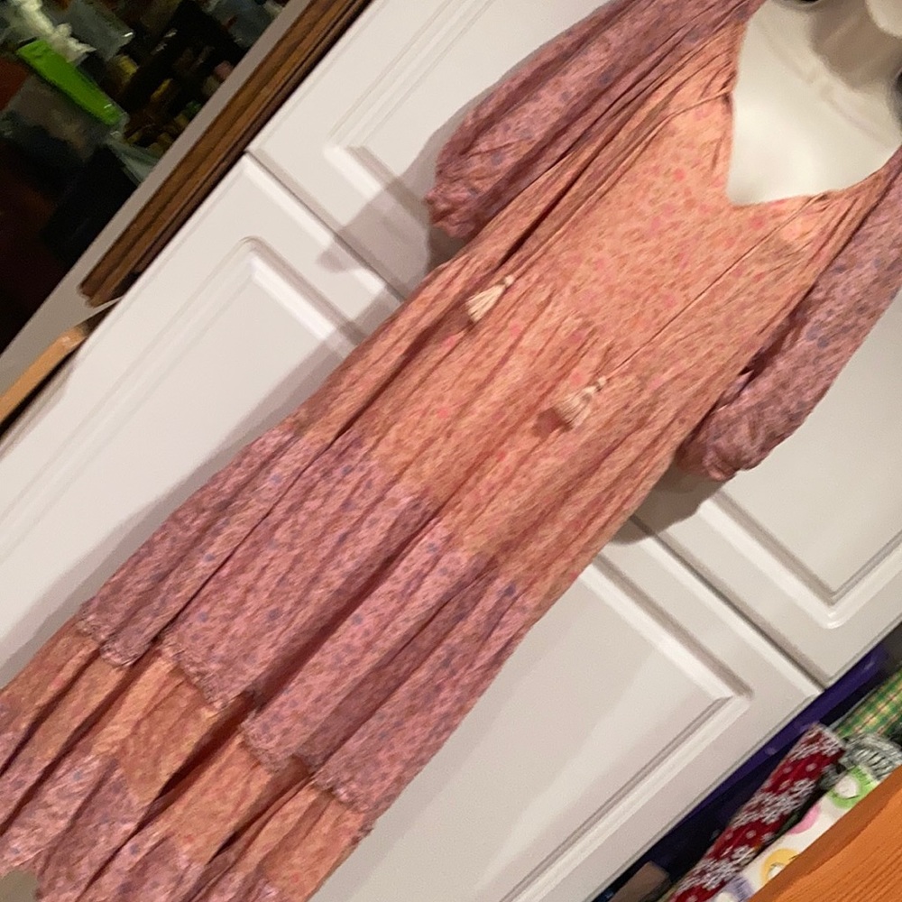 Spell and the gypsy collective Rae gown in peach.